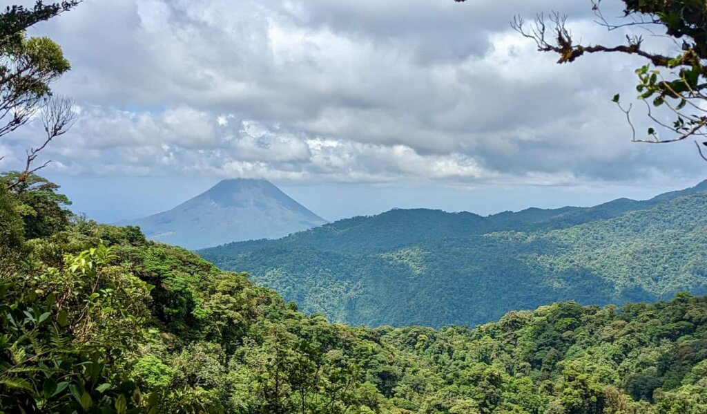 The stunning view overlooking the Arenal volcano in Costa Rica, with lush greenery everywhere