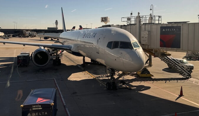 picture of a delta airplane at the gate ready for take off